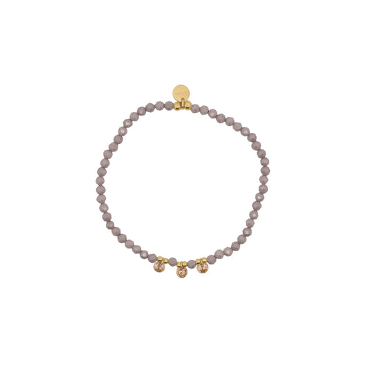 Bracciale elastico Rue Des Mille con sfere marroni e zirconi elastico