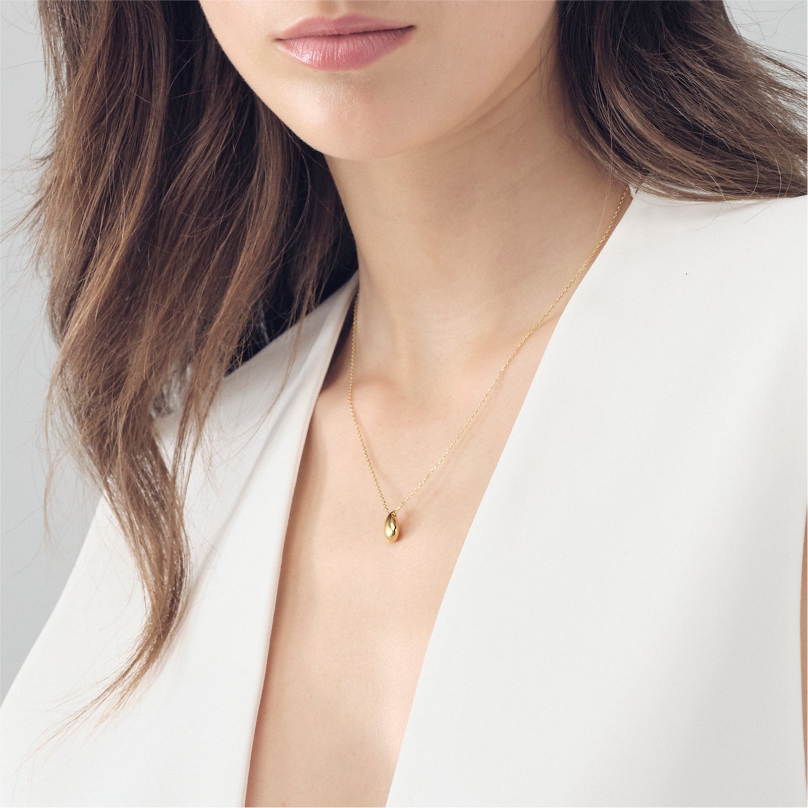 Collana girocollo Unoaerre in bronzo dorato con ciondolo