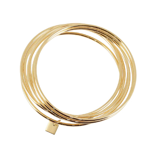 Set di sette bracciali rigidi ZAG Bijoux in acciaio dorato Diametro 6,5 cm