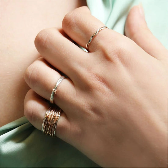 Anello Rubinia Filodamore oro rosa e argento filo intrecciato 13