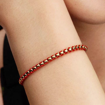 Bracciale Pandora in argento dorato con tessuto rosso