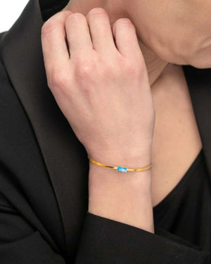 Bracciale maglia snake da donna della collezione Marlù Sparkles in acciaio 316L dorato con zircone azzurro taglio baguette 31BR0010G-AM