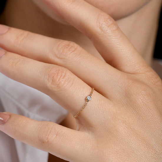 Anello morbido Burato Solitaire donna in oro rosa arco e diamante 0,03ct BN974-2