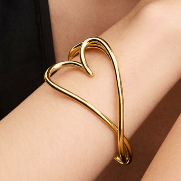 Bracciale bangle Pandora Essence in argento dorato a cuore