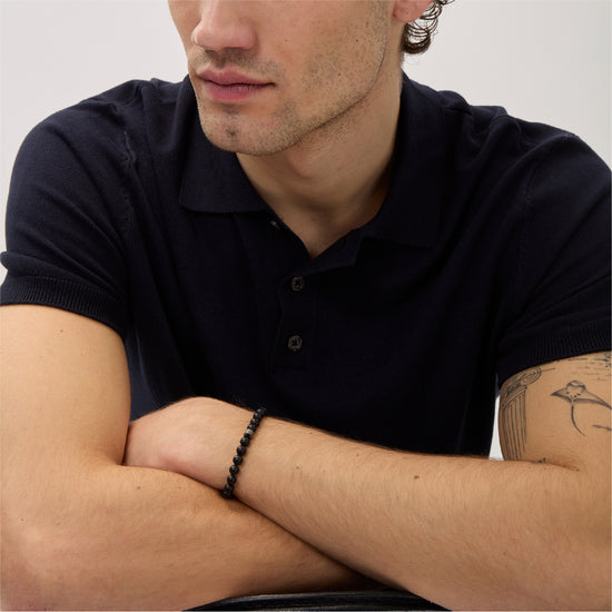 Bracciale uomo Breil Wild con sfere di agata nera opaca e centrale in acciaio Regolabile 17-22 cm