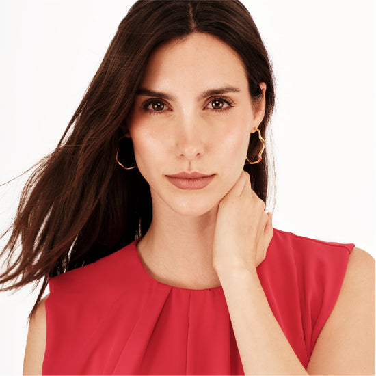 Orecchini a cerchio Breil Zig Zag in acciaio dorato lucido