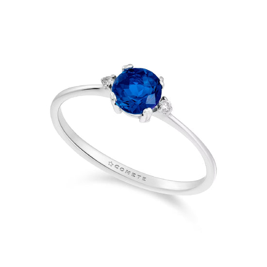 Anello solitario Comete in oro bianco con diamanti e zaffiro SU MISURA