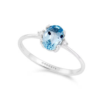 Anello solitario Comete in oro bianco con diamanti e topazio SU MISURA