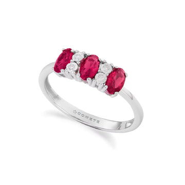 Anello trilogy Comete con diamanti bianchi e rubini 0,69ct SU MISURA