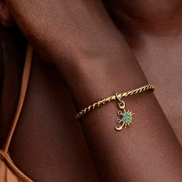 Charm Pandora in argento dorato con granchio