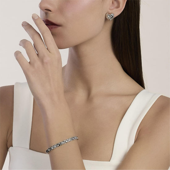 Bracciale bangle Kidult Style in acciaio martellato e cristalli Rigido