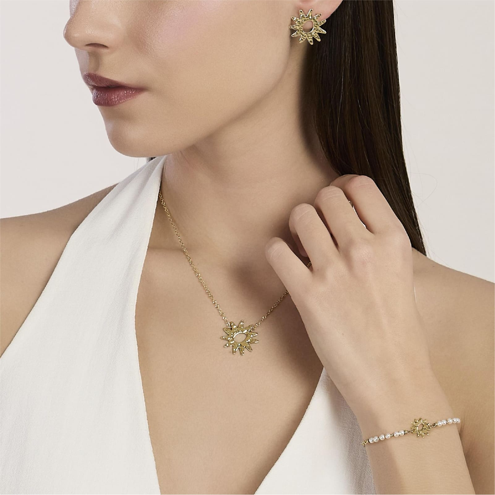 Bracciale Kidult Style in acciaio pvd oro perle e sole centrale 19 cm