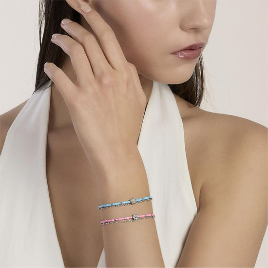 Bracciale Kidult Style in acciaio con cilindri turchese e fiore 19 cm