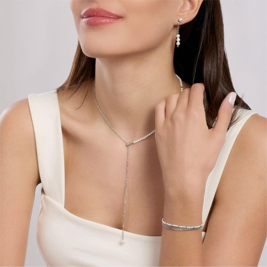 Orecchini pendenti Kidult Style in acciaio con perle bianche MISURA UNICA