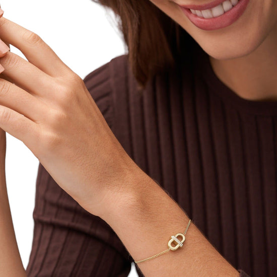 Bracciale Fossil Heritage da donna in acciaio oro con ciondolo a maglia a D e cristalli JF04584710-4