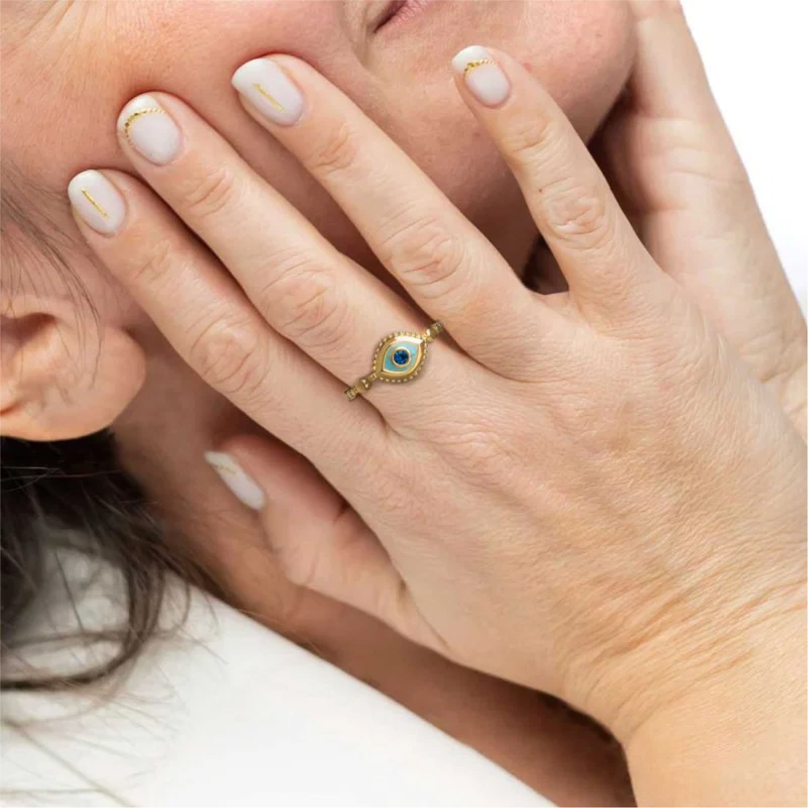 Anello regolabile Marlù in acciaio dorato e occhio blu REGOLABILE