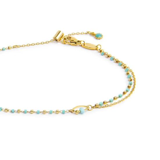Cavigliera regolabile Marlù in acciaio oro pietre azzurro 26 cm