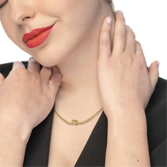 Collana Marlù in acciaio dorato con nodo e catena foxtail MISURA UNICA