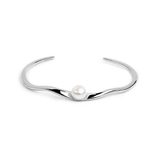 Bracciale rigido in acciaio con forma organica con perla diamentro 6 cm