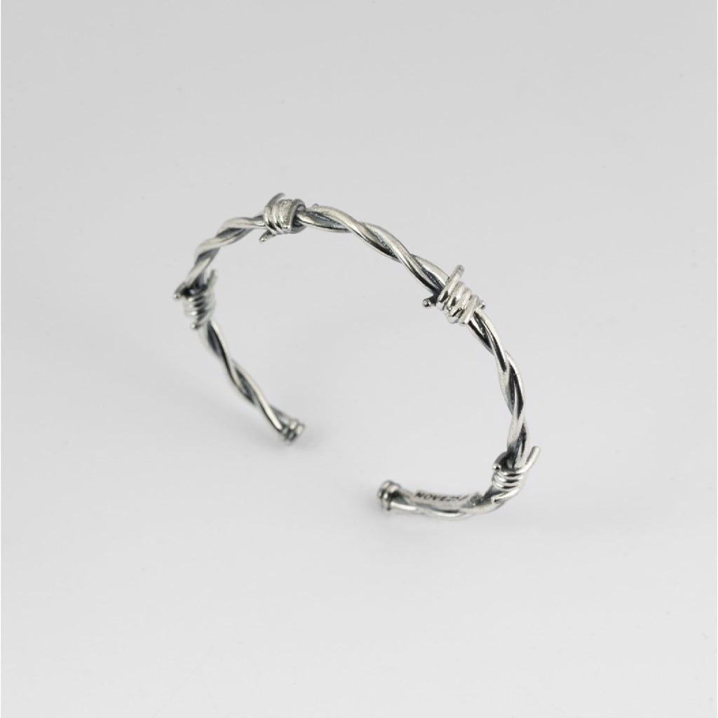 Bracciale rigido aperto della collezione Nove25 Filo Spinato unisex in argento 925 a forma di filo spinato N25BRA00288