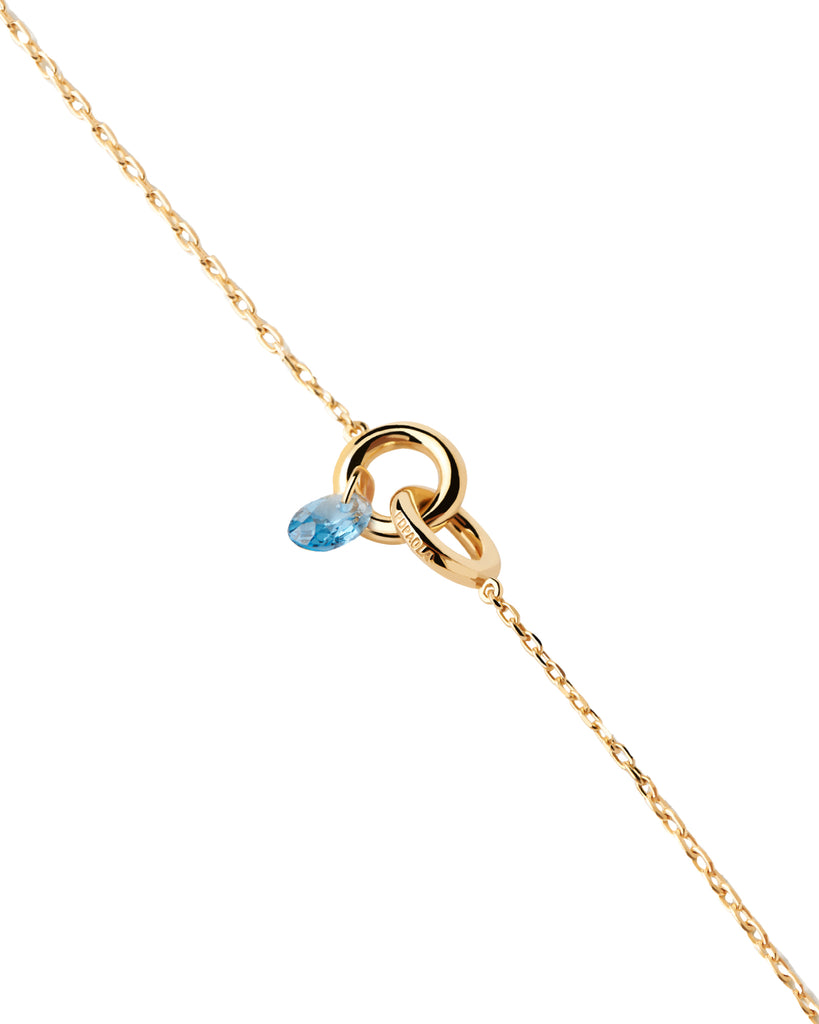 Bracciale catena da donna della collezione PDPAOLA Essential in argento 925 dorato con zircone blu pendente PU01-774-U