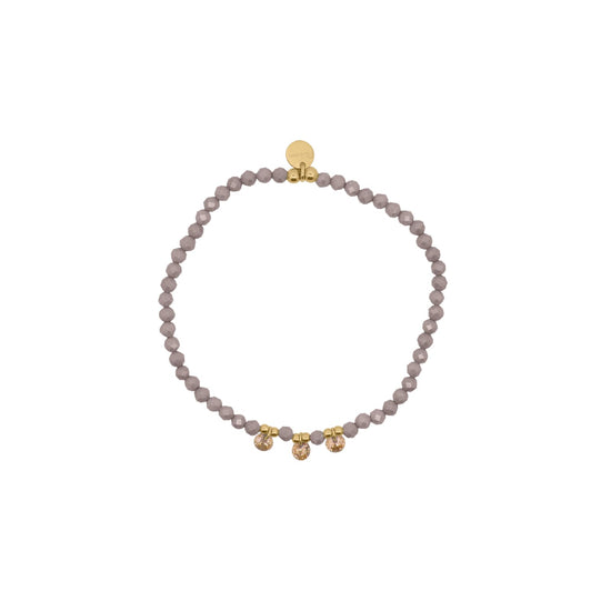 Bracciale elastico Rue Des Mille con sfere marroni e zirconi elastico