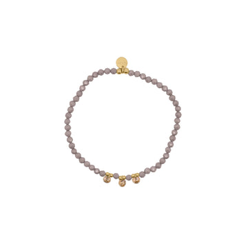 Bracciale elastico Rue Des Mille con sfere marroni e zirconi elastico