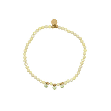 Bracciale elastico Rue Des Mille con sferette e zirconi verde