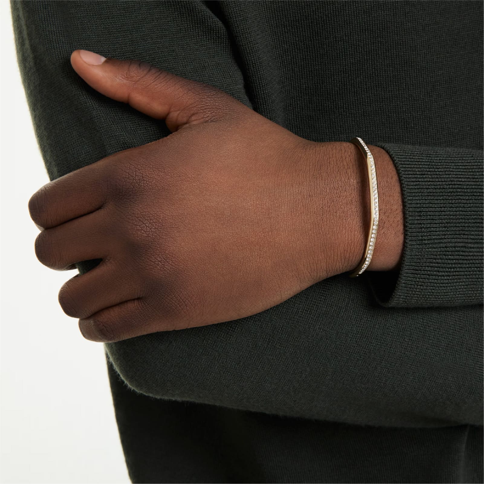 Bracciale rigido Swarovski dorato con cristalli bianchi M 17 cm