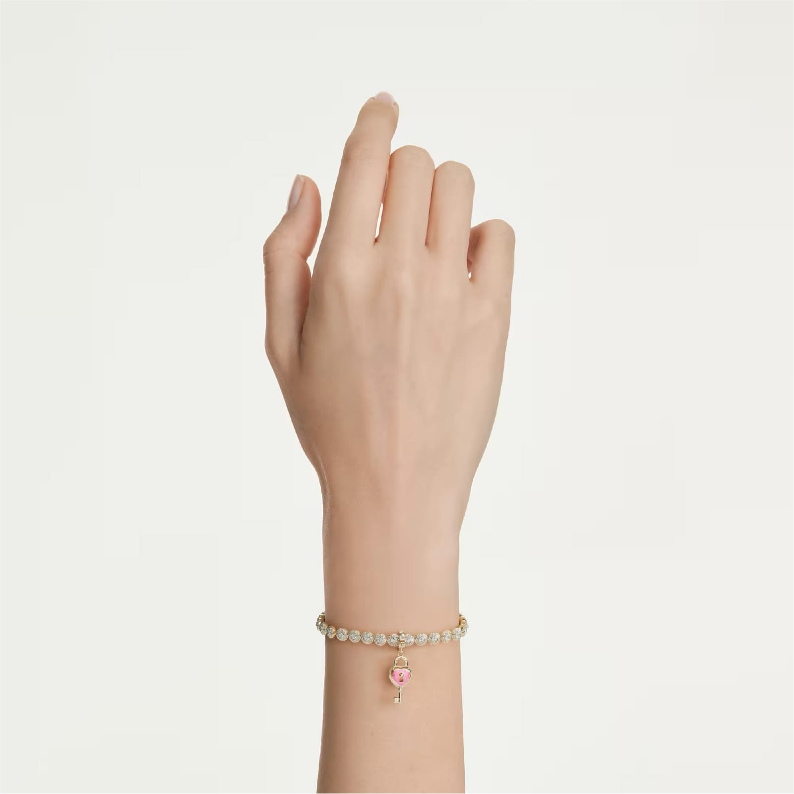 Charm chiave Swarovski Idyllia dorato con zircone centrale MISURA UNICA