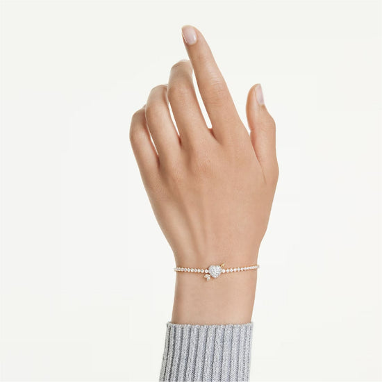 Bracciale Swarovski dorato con cuore trafitto e cristalli cry 24 cm