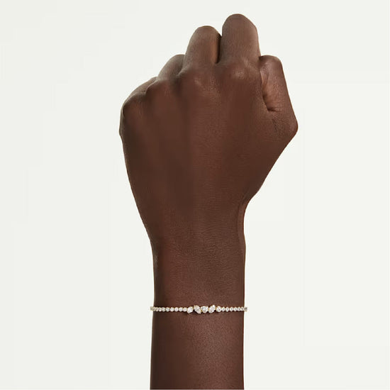 Bracciale regolabile Swarovski Mesmera lega dorata e zirconi REGOLABILE