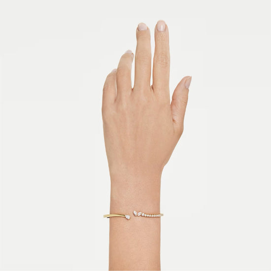 Bracciale rigido Swarovski Mesmera lega dorata e zirconi 16,8 cm