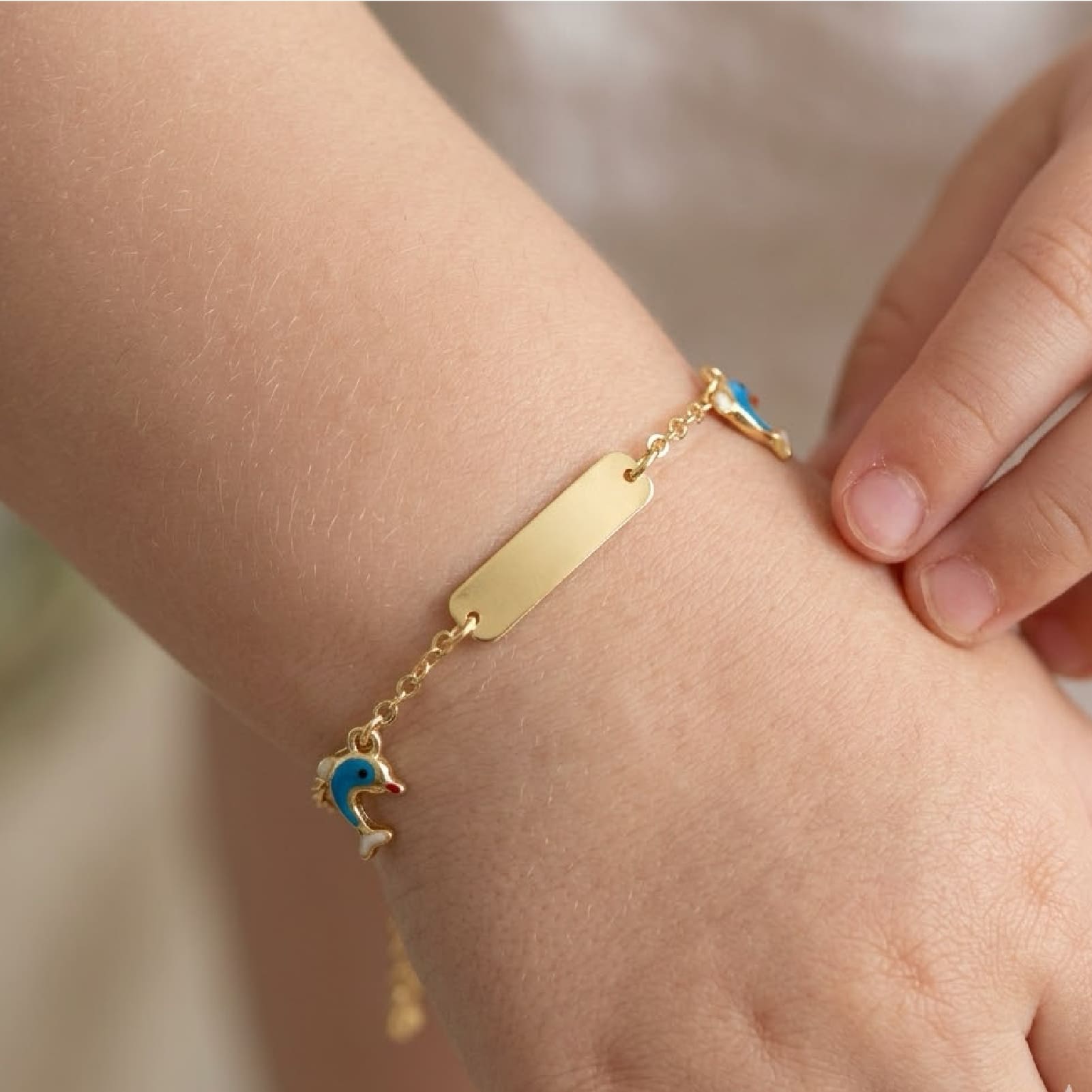 Bracciale targhetta Joy Gioielli oro 9kt con delfini smaltati 16 cm