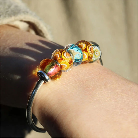 Beads Trollbeads Buon compleanno 2026 in argento e vetro giallo MISURA UNICA