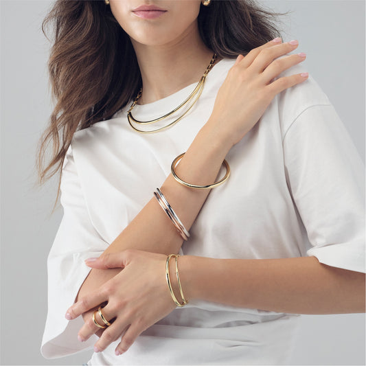 Bracciale rigido da donna Unoaerre in bronzo rosà© liscio