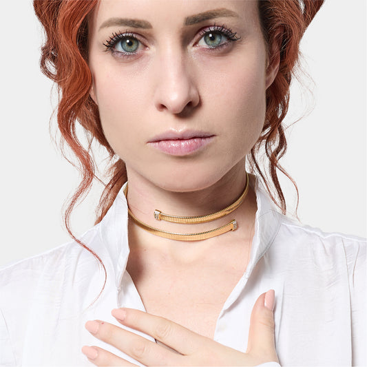 Collana rigida Unoaerre in bronzo dorato con zirconi bianchi