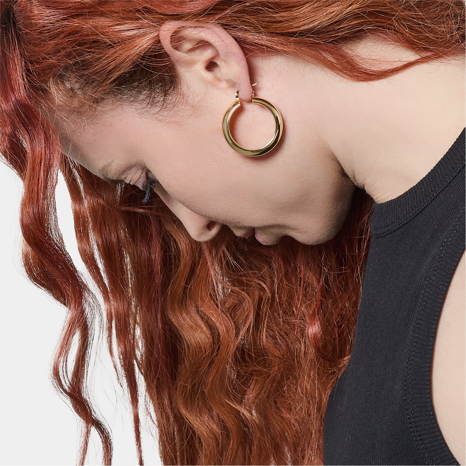 Orecchini a cerchio donna Unoaerre bronzo dorato spessi