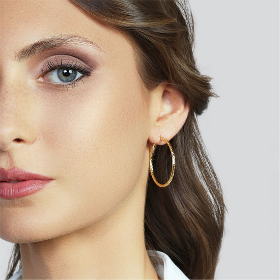 Orecchini a cerchio mini Unoaerre diamantati bronzo dorato MISURA UNICA