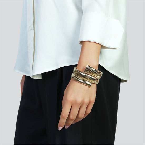 Bracciale rigido maxi Unoaerre tubogas in bronzo dorato 20 cm