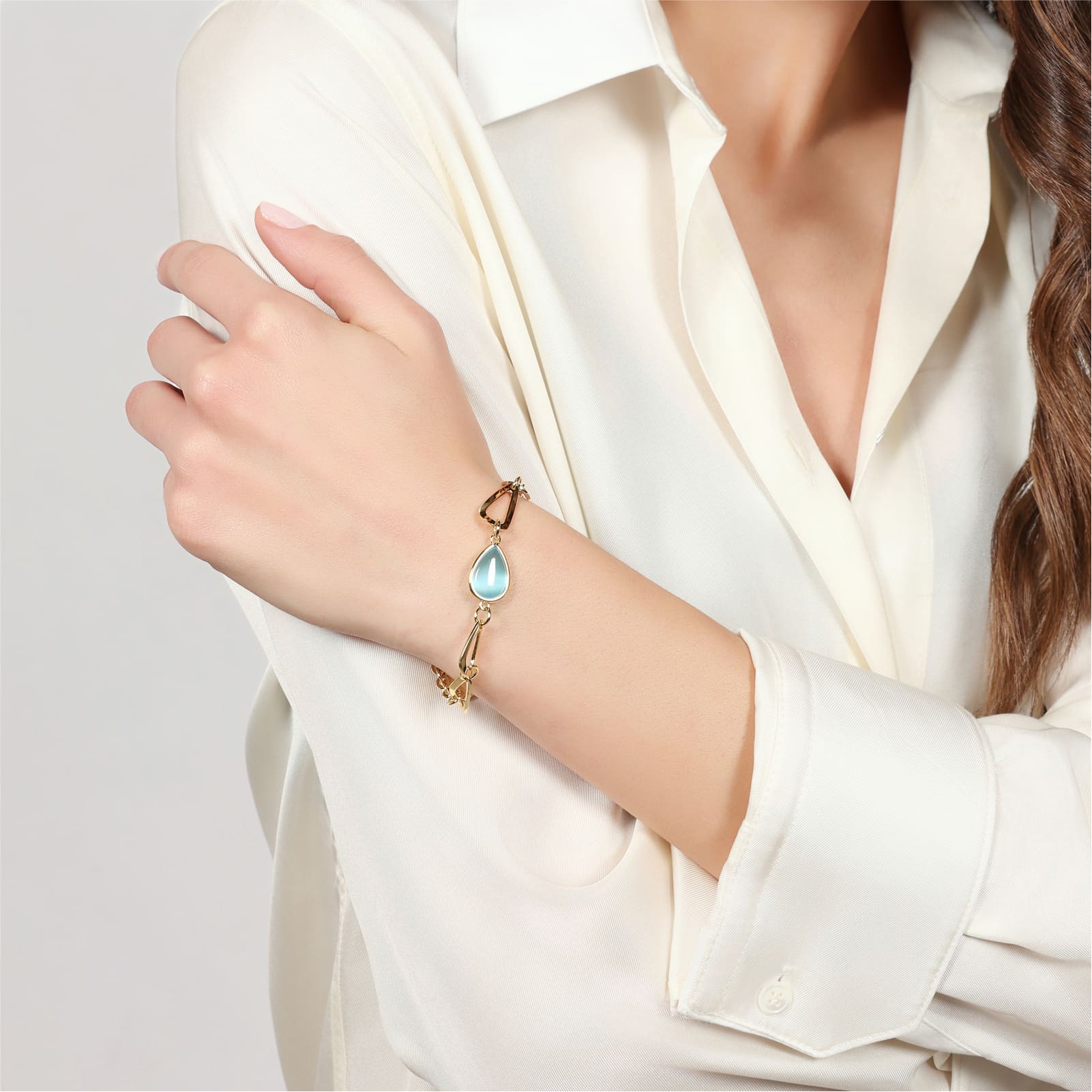 Bracciale Unoaerre Joya in bronzo dorato goccia azzurra 19 cm
