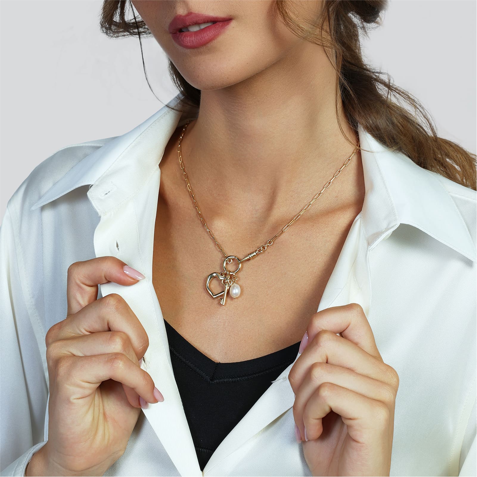 Collana Unoaerre in argento dorato con cuore chiave e perla MISURA UNICA