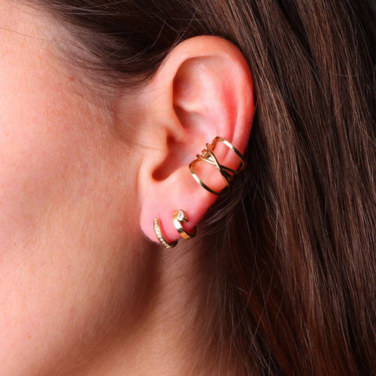 Earcuff ZAG Bijoux in acciaio dorato con design intrecciato MISURA UNICA
