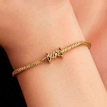 Charm Pandora Besos in argento dorato JOY Gioielli